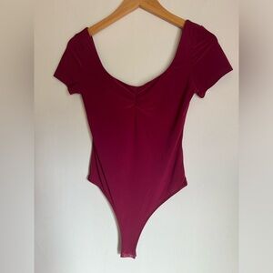 Popular 21 NWT pink bodysuit thong short sleeve Size Small